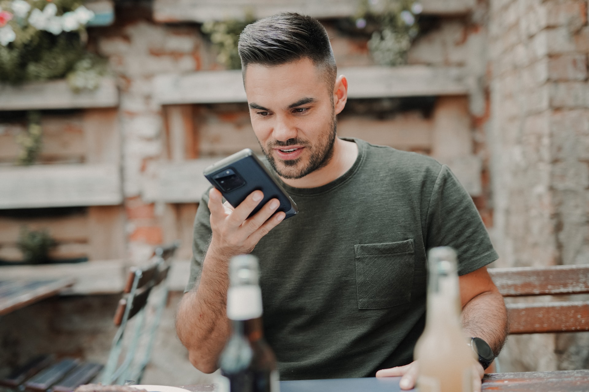 Man sending voice message