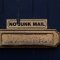 A no junk mail box on a blue door email server, error message, troubleshooting