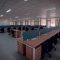 an empty office space with desks and chairs IT administrator,enterprise,macOS management