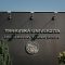 a sign on the side of a building that says travavska university campus, university, artificial intelligence, innovation