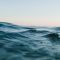 body of water under sky navy ship, ocean, ai interface, futuristic dashboard