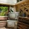 an old tv sitting on top of a wooden bench farmhouse media console, rustic cabinet, wooden tv stand, home decor