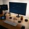 black flat screen computer monitor on brown wooden desk xbox controller, pc error, system resources