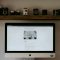 silver imac on brown wooden table website generator, creative ideas, silly website concepts