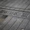 Text in an asian language is embedded in pavement. seo issues canonical tags search engines