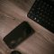 black iphone 7 beside black logitech cordless computer keyboard qwerty keyboard, retro phone, iPhone case