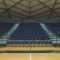 Chris Rodstrom: A Deep Dive Into Career, Influence, and Public Interest a basketball court with rows of empty seats elegant couple courtside basketball arena, supportive spouse, professional basketball game