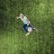 aerial view of man playing soccer ball on grass quarterback pump fake animation football video game
